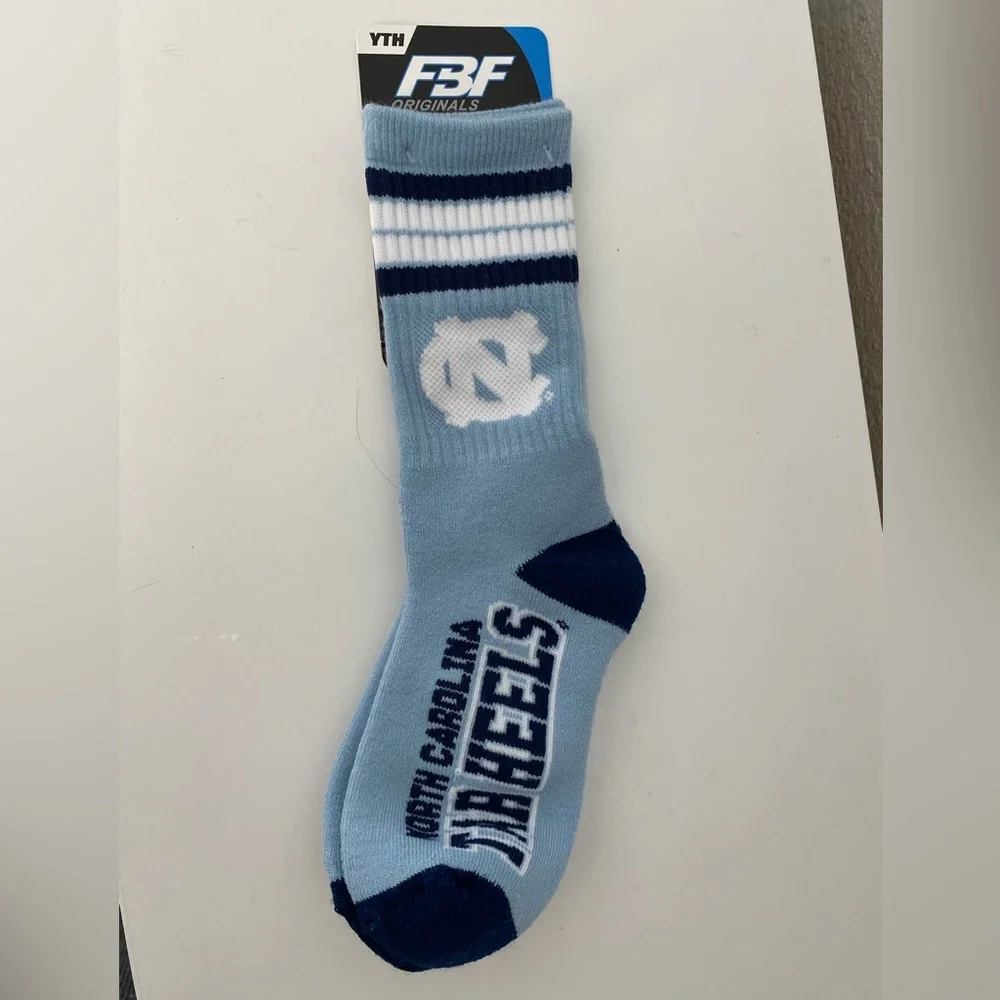 For Bare Feet Youth North Carolina Tar Heels 4-Stripe Deuce crew socks 13.(1-3)
